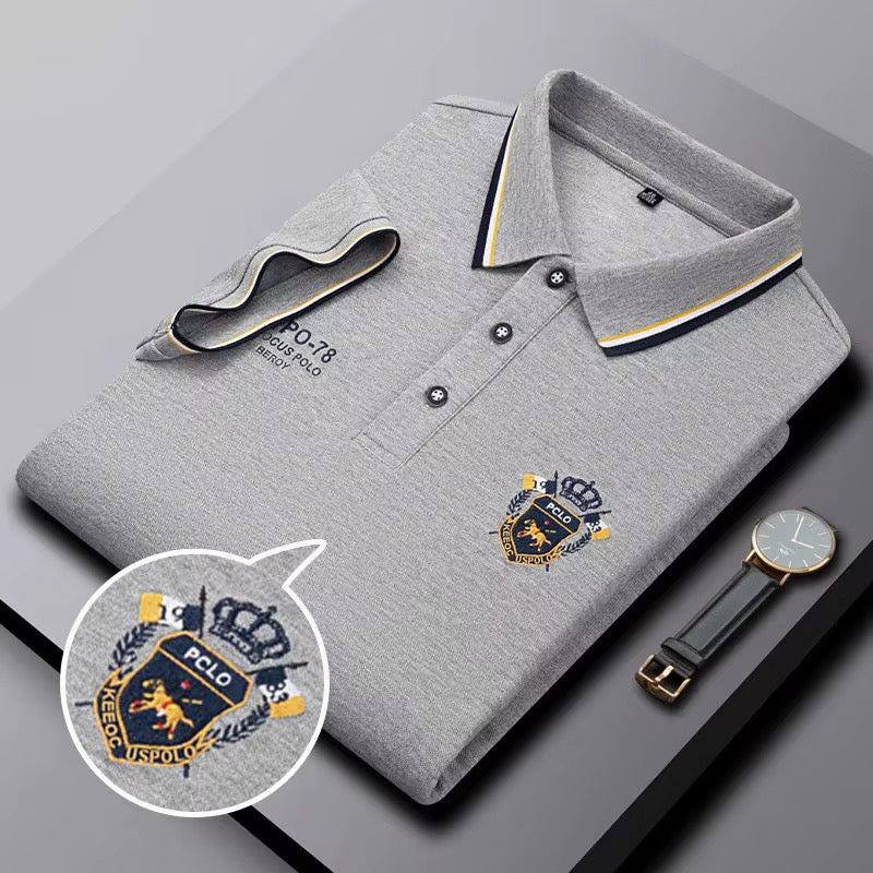 Gray embroidered short-sleeved polo shirt, breathable, casual and professional style by AURORE LUXURE. Perfect for relaxed summer wear.